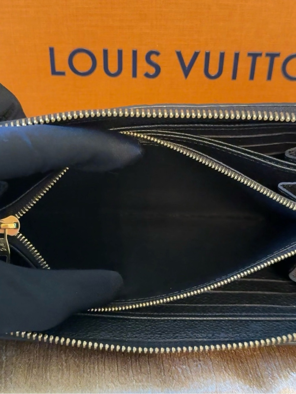 LV classic Empreinte leather embossed monogram Clemence wallet in Noir - Picture 11 of 13